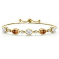 thumbnail image 1 of Gem Stone King 18K Yellow Gold Plated Silver White Moissanite and Ecstasy Mystic Topaz Bracelet for Women | 4.70 Cttw | Gemstone Birthstone | Oval 7X5MM | Fully Adjustable 9 inch, 1 of 6