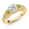 thumbnail image 1 of Gem Stone King 18K Yellow Gold Plated Silver White Topaz Green Peridot and White Moissanite Engagement Ring for Women (1.41 Cttw, Gemstone November Birthstone, Round 6MM and 3MM, Size 8), 1 of 4