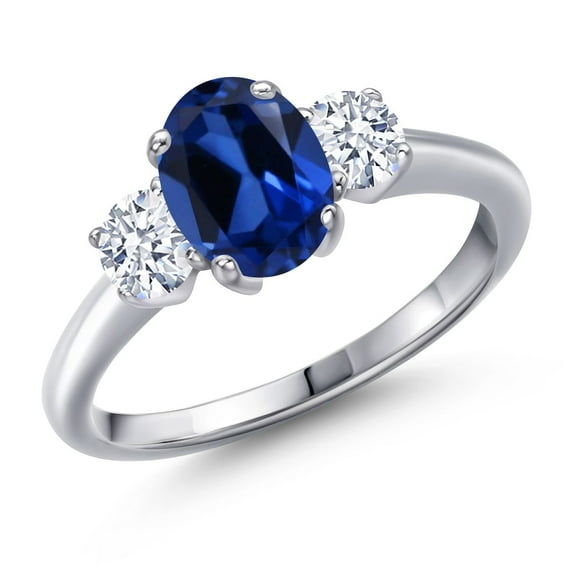 Gem Stone King 2.10 Cttw Blue Created Sapphire 3-Stone Engagement Ring for Women | 925 Sterling Silver | Oval 8X6MM and Round 4MM | Three Stone Wedding Anniversary Promise Ring for Women