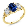thumbnail image 1 of Gem Stone King 2.84 Ct Oval Blue Created Sapphire White Topaz 10K Yellow Gold Ring, 1 of 4