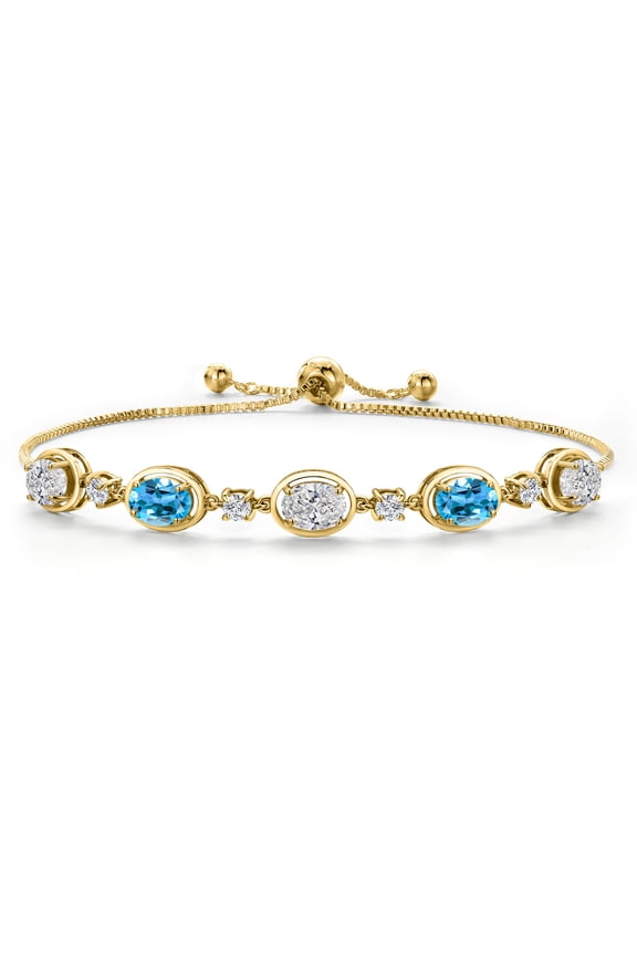 18K Yellow Gold Plated Silver White Lab Grown Diamond and Swiss Blue Topaz, Lab Grown Diamond Bracelet for Women | 4.50 Cttw | Gemstone April Birthstone | Oval 7X5MM | Fully Adjustable 9 inch