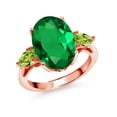 thumbnail image 1 of Gem Stone King 4.83 Ct Oval Green Nano Emerald Green Peridot 18K Rose Gold Plated Silver 3-Stone Engagement Ring, 1 of 6