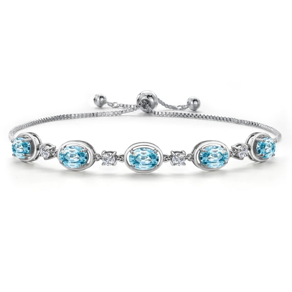 Gem Stone King 925 Sterling Silver Blue Zircon and Lab Grown Diamond Bracelet for Women | 6.65 Cttw | Gemstone Birthstone | Oval 7X5MM | Fully Adjustable 9 inch