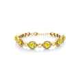 thumbnail image 1 of Gem Stone King 18K Yellow Gold Plated Silver Canary Mystic Topaz Tennis Bracelet for Women (6.72 Cttw, Oval 7X5MM, 7 inch with 1 inch Extender), 1 of 4