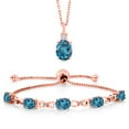 thumbnail image 1 of Gem Stone King 7.28 Ct Oval London Blue Topaz 18K Rose Gold Plated Silver Lab Grown Diamond Pendant and Bracelet Jewelry Set, 1 of 3