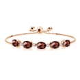 thumbnail image 1 of Gem Stone King 7.93 Cttw Oval Checkerboard Red Garnet and White Lab Grown Diamond 18K Rose Gold Plated Silver Bracelet for Women | Fully Adjustable up to 9 inch, 1 of 2