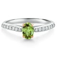 thumbnail image 1 of Gem Stone King 925 Silver and 10K Rose Gold Green Peridot and White Lab Grown Diamond Engagement Ring for Women (0.68 Cttw, Oval 6X4MM, Gemstone August Birthstone, Size 7), 1 of 4