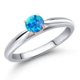 thumbnail image 1 of Gem Stone King 925 Silver and 10K Rose Gold Simulated Blue Opal Engagement Ring for Women | 0.25 Cttw | Round Cabochon 4MM | Gemstone October Birthstone | Size 8, 1 of 6