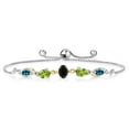 thumbnail image 1 of Gem Stone King 925 Silver and 10K Yellow Gold Black Onyx Green Peridot London Blue Topaz and Lab Grown Diamond Tennis Bracelet for Women By Keren Hanan (1.63 cttw, Adjustable up To 9 inch), 1 of 3