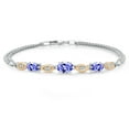 thumbnail image 1 of Gem Stone King 925 Silver and 10K Yellow Gold Blue Tanzanite and White Lab Grown Diamond Bracelet for Women (1.71 Cttw, Gemstone December Birthstone, Oval, Wheat Chain, 6.5 inches), 1 of 5