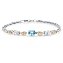Gem Stone King 925 Silver and 10K Yellow Gold Blue Zircon and White Moissanite and White Lab Grown Diamond Bracelet for Women (2.31 Cttw, Gemstone, Oval, Wheat Chain, 7.5 inches)