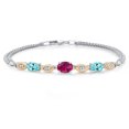 thumbnail image 1 of Gem Stone King 925 Silver and 10K Yellow Gold Red Created Ruby and Blue Apatite and White Lab Grown Diamond Bracelet for Women (1.95 Cttw, Gemstone July Birthstone, Oval, Wheat Chain, 6.5 inches), 1 of 5