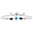 thumbnail image 1 of Gem Stone King 925 Silver and 10K Yellow Gold Swiss Blue Topaz Blue Sapphire White Moissanite and Lab Grown Diamond Tennis Bracelet for Women By Keren Hanan (1.79 cttw, Adjustable up To 9 inch), 1 of 3