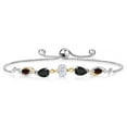 thumbnail image 1 of Gem Stone King 925 Silver and 10K Yellow Gold White Moissanite Black Onyx Red Garnet and Lab Grown Diamond Tennis Bracelet for Women By Keren Hanan (1.62 cttw, Adjustable up To 9 inch), 1 of 3