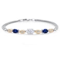 thumbnail image 1 of Gem Stone King 925 Silver and 10K Yellow Gold White Moissanite and Blue Created Sapphire and White Lab Grown Diamond Bracelet for Women (2.16 Cttw, Gemstone, Oval, Wheat Chain, 7.5 inches), 1 of 5