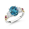 thumbnail image 1 of Gem Stone King 925 Silver and 10K Yellow Gold 3-Stone Ring Oval London Blue Topaz and Moissanite (2.75 Cttw, Size 7), 1 of 3