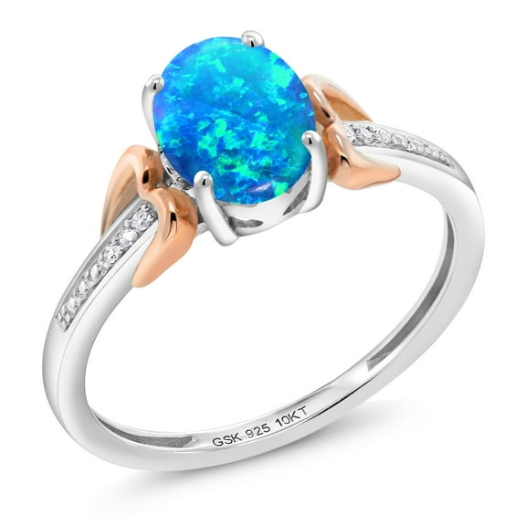 Gem Stone King 925 Sterling Silver and 10K Rose Gold Blue Simulated Opal and Diamond Women Engagement Ring (1.05 Ct Oval Cabochon Cut, Size 9)