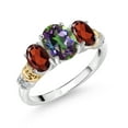 thumbnail image 1 of Gem Stone King 925 Sterling Silver and 10K Yellow Gold Oval Green Mystic Topaz Red Garnet and White Diamond 3 Stone Ring for Women (2.74 Cttw, Gemstone Birthstone, Size 5), 1 of 3