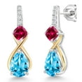 thumbnail image 1 of Gem Stone King 925 Sterling Silver and 10K Yellow Gold Pear Shape Swiss Blue Topaz Red Created Ruby and White Lab Grown Diamond Dangle Earrings for Women (3.43 Cttw, Pear Shape 8X6MM), 1 of 4