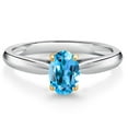 thumbnail image 1 of Gem Stone King 925 Sterling Silver and 10K Yellow Gold Swiss Blue Topaz Solitaire Engagement Ring for Women (1.00 Cttw, Oval 7X5MM, Gemstone November Birthstone, Available in Size 5, 6, 7, 8, 9), 1 of 4