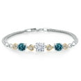 thumbnail image 1 of Gem Stone King 925 Sterling Silver and 10k Yellow Gold White Moissanite London Blue Topaz and White Lab Grown Diamond Bracelet for Women (3.48 Cttw, Round 7MM and 6MM, 6.5/7/7.5 inch, Made in Italy), 1 of 4