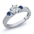 thumbnail image 1 of Gem Stone King 925 Sterling Silver 3-Stone Ring Set with Near Colorless (GH, Size 5) Round Moissanite and Created Sapphire (0.78 Cttw, Size 5), 1 of 2
