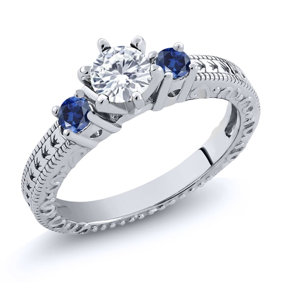 Gem Stone King 925 Sterling Silver 3-Stone Ring Set with Near Colorless (GH, Size 5) Round Moissanite and Created Sapphire (0.78 Cttw, Size 5)