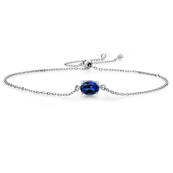 Gem Stone King 925 Sterling Silver Blue Created Sapphire Solitaire Bracelet for Women (1.00 Cttw, Oval Cut 7x5mm)