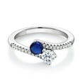 thumbnail image 1 of Gem Stone King 925 Sterling Silver Blue Created Sapphire and White Topaz Bypass Ring for Women (0.82 Cttw, Gemstone September Birthstone, Round 4MM, Available in Size 5, 6, 7, 8, 9), 1 of 4