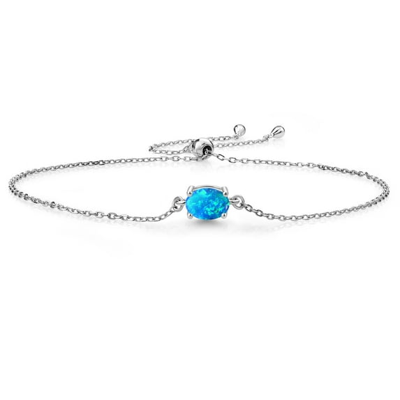 Gem Stone King 925 Sterling Silver Blue Opal Solitaire Bracelet for Women (0.63 Cttw, Oval Cabochon Cut 7x5mm)