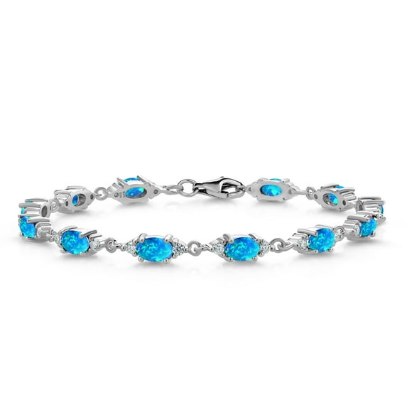 Gem Stone King 925 Sterling Silver Blue Simulated Opal and White Moissanite Tennis Bracelet for Women (6.91 Cttw, Gemstone Birthstone, Oval/Cabochon 6X4MM, 7 inch)