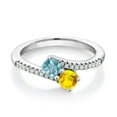 thumbnail image 1 of Gem Stone King 925 Sterling Silver Blue Zircon and Yellow Sapphire Bypass Ring for Women (1.10 Cttw, Gemstone December Birthstone, Round 4MM, Size 5), 1 of 4