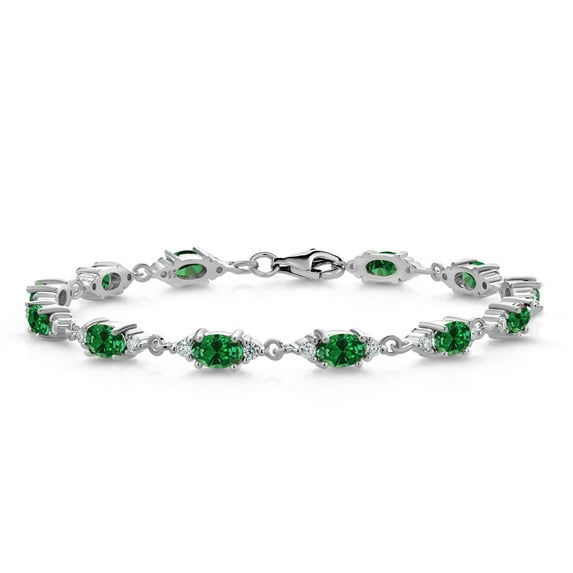 Gem Stone King 925 Sterling Silver Green Created Emerald and White Moissanite Tennis Bracelet for Women (5.11 Cttw, Gemstone Birthstone, Oval 6X4MM, 7.5 inch)