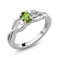 thumbnail image 1 of Gem Stone King 925 Sterling Silver Green Peridot Engagement Ring for Women (0.50 Cttw, Gemstone Birthstone, Oval 6X4MM, Available in Size 5,6,7,8,9), 1 of 5