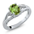 thumbnail image 1 of Gem Stone King 925 Sterling Silver Green Peridot and White Diamond 3 Stone Engagement Ring for Women | 1.40 Cttw | Oval 8X6MM | Round 2MM | Gemstone August Birthstone | Size 5, 1 of 5