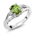 thumbnail image 1 of Gem Stone King 925 Sterling Silver Green Peridot and White Lab Grown Diamond 3 Stone Engagement Ring for Women | 1.50 Cttw | Oval 8X6MM | Round 2MM | Gemstone August Birthstone | Size 8, 1 of 6