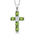 thumbnail image 1 of Gem Stone King 3.00 Cttw Green Peridot and White Moissanite Cross Pendant Necklace for Women | 925 Sterling Silver | Gemstone August Birthstone | Oval 6X4MM | With 18 inch Chain, 1 of 6