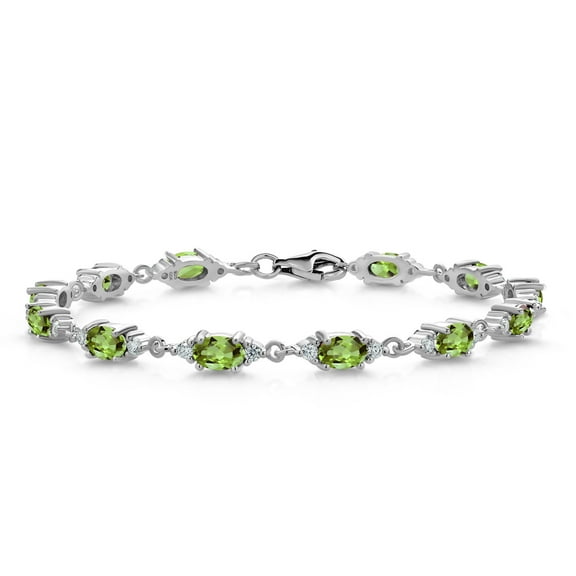 Gem Stone King 925 Sterling Silver Green Peridot and White Moissanite Tennis Bracelet for Women (6.91 Cttw, Gemstone Birthstone, Oval 6X4MM, 7.5 inch)