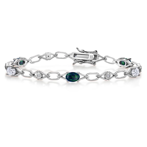 Gem Stone King 925 Sterling Silver Green Simulated Opal and White Moissanite and Round White Lab Grown Diamond Tennis Bracelet for Women (3.04 Cttw, Gemstone Birthstone, Oval 6X4MM, 7.25 inches)