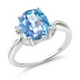 thumbnail image 1 of Gem Stone King 925 Sterling Silver Millennium Blue Mystic Quartz and White Created Sapphire 3 Stone Ring for Women (3.03 Cttw, Oval 10X8MM, Gemstone Birthstone, Size 5), 1 of 4