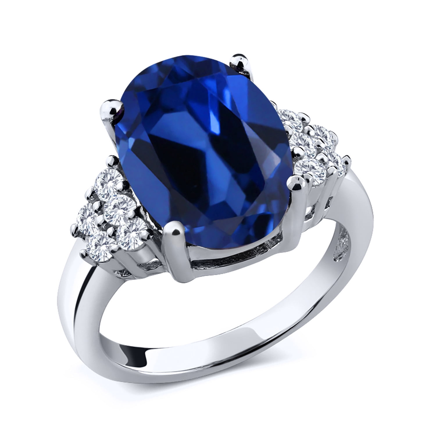 Gem Stone King 925 Sterling Silver Oval Blue Created Sapphire and White Moissanite Ring for Women (6.38 Cttw, Oval 12X10MM, Size 9)