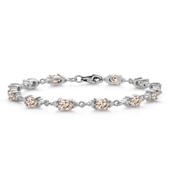 Gem Stone King 925 Sterling Silver Peach Morganite and White Moissanite Tennis Bracelet for Women (6.91 Cttw, Gemstone Birthstone, Oval 6X4MM, 7.5 inch)