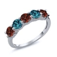 thumbnail image 1 of Gem Stone King 925 Sterling Silver Red Garnet and London Blue Topaz Wedding Band Ring for Women 1.00 Cttw, Round 3.5MM, Gemstone January Birthstone (Size 5), 1 of 2