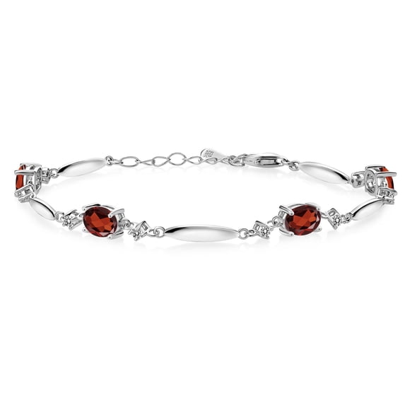Gem Stone King 925 Sterling Silver Red Garnet and White Diamond Tennis Bracelet for Women | 3.74 Cttw | Gemstone January Birthstone | Oval 7X5MM | 6 inch + 1 inch Extender