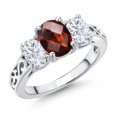 thumbnail image 1 of Gem Stone King 925 Sterling Silver Red Garnet and White Moissanite Filigree Style 3 Stone Ring for Women (2.53 Cttw, Oval 8X6MM and 6X4MM) (Size 7), 1 of 6