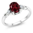 thumbnail image 1 of Gem Stone King 925 Sterling Silver Red Rhodolite Garnet and White Moissanite 3-Stone Rings for Women (1.43 Cttw, Gemstone January Birthstone, Oval 8X6MM, Available in Size 5, 6, 7, 8, 9), 1 of 5