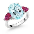 thumbnail image 1 of Gem Stone King 925 Sterling Silver Sky Blue Topaz and Red Created Ruby Ring for Women (8.18 Cttw, 14X10MM Oval and 7X5MM Pear Shape, Gemstone November Birthstone, Size 9), 1 of 3