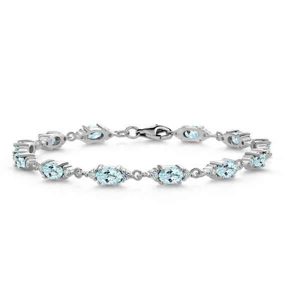 Gem Stone King 925 Sterling Silver Sky Blue Topaz and White Moissanite Tennis Bracelet for Women (6.91 Cttw, Gemstone Birthstone, Oval 6X4MM, 6.5 inch)