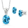 thumbnail image 1 of Gem Stone King 925 Sterling Silver Swiss Blue Topaz and White Diamond Pendant and Earrings Jewelry Set for Women (7.03 Cttw, Gemstone Birthstone, Oval 11X9MM and 8X6MM with 18 inch Silver Chain), 1 of 3