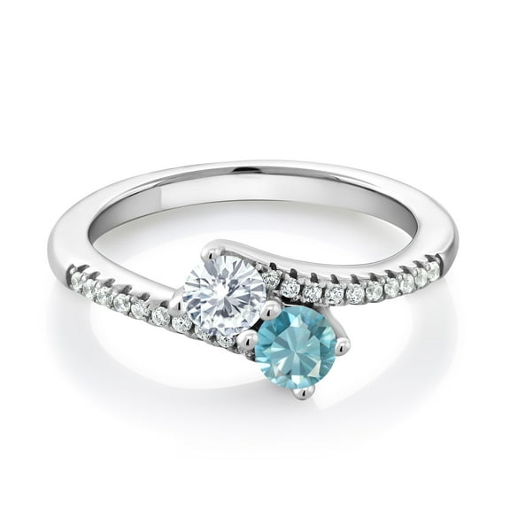 Gem Stone King 925 Sterling Silver White Moissanite from Charles & Colvard and Blue Zircon Bypass Ring for Women (0.97 Cttw, Gemstone Birthstone, Round 4MM, Available in Size 5, 6, 7, 8, 9)